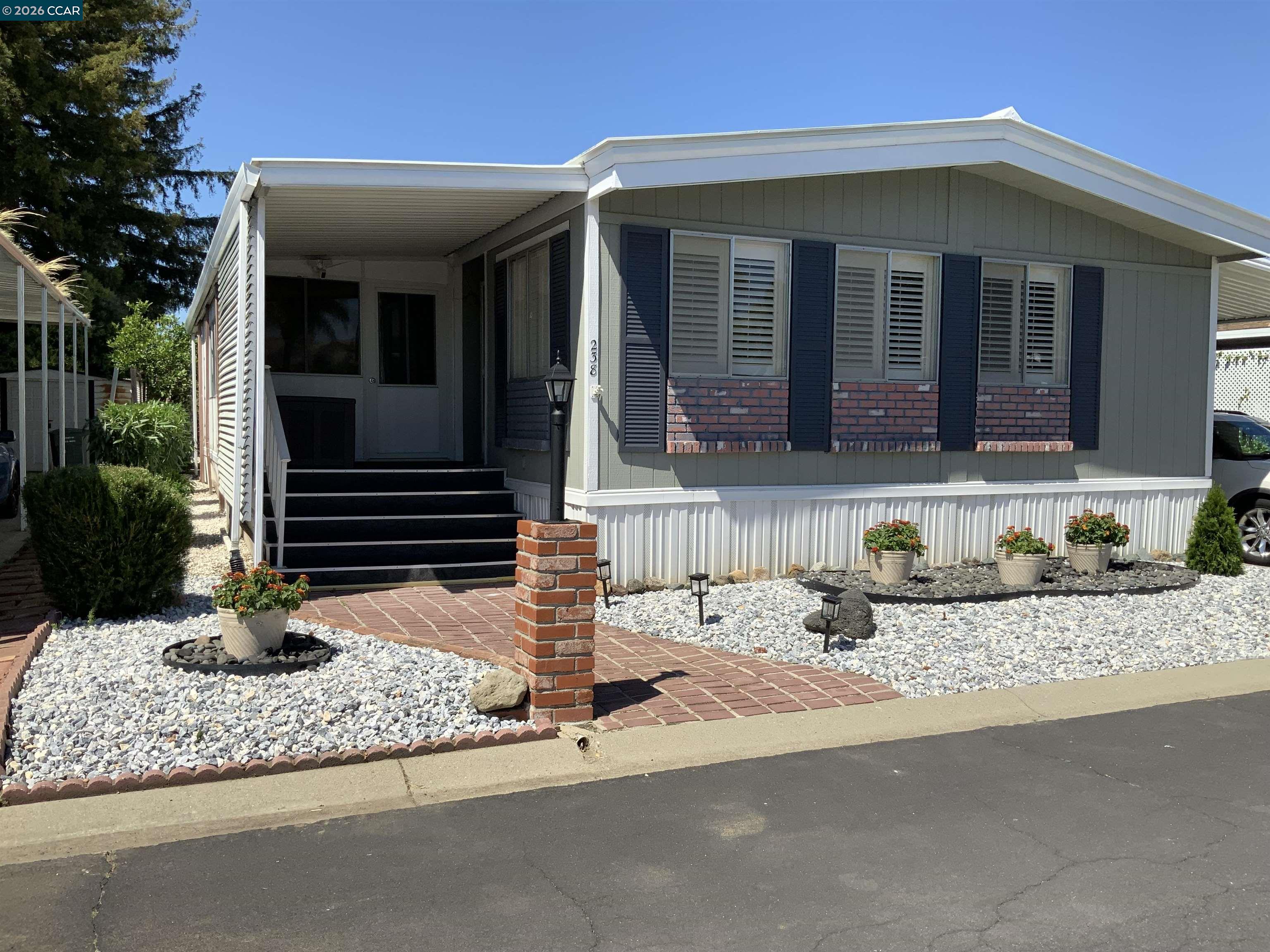238 Aloha Pittsburg, CA 94565 - Photo 2 of 42 a front view of a house with porch