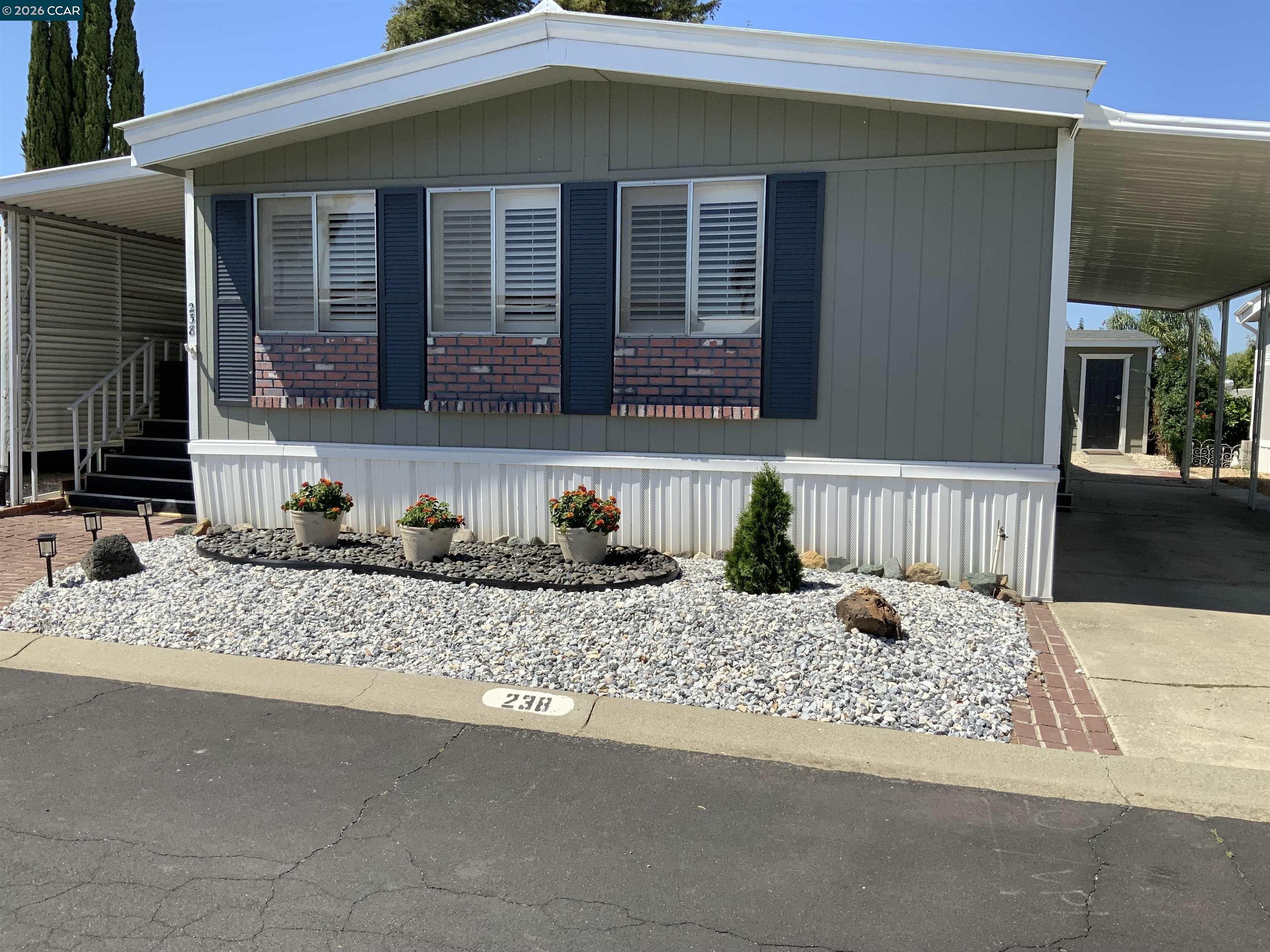 238 Aloha Pittsburg, CA 94565 - Photo 3 of 42 a view of a house with a patio