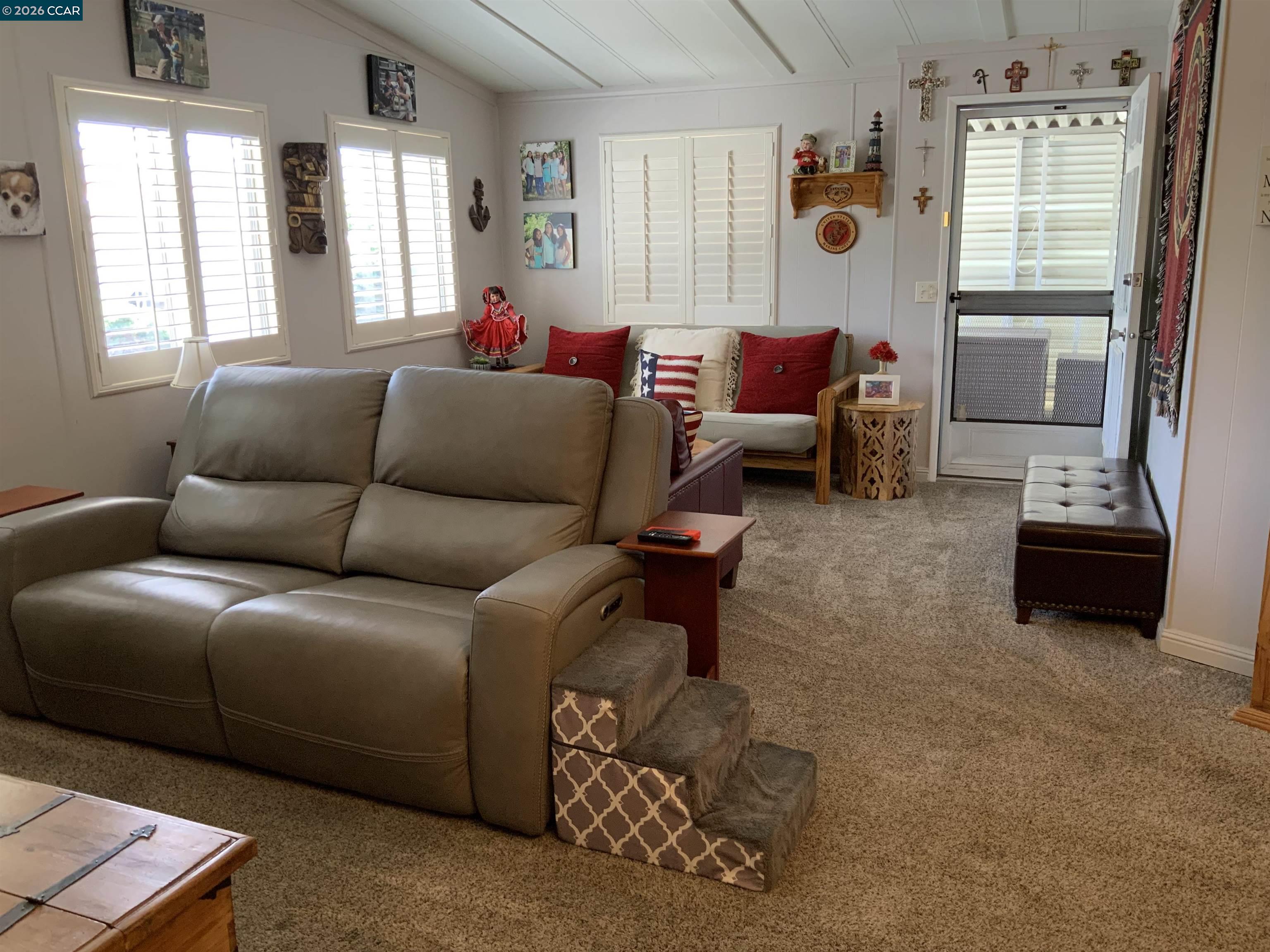 238 Aloha Pittsburg, CA 94565 - Photo 7 of 42 a living room with furniture and a window