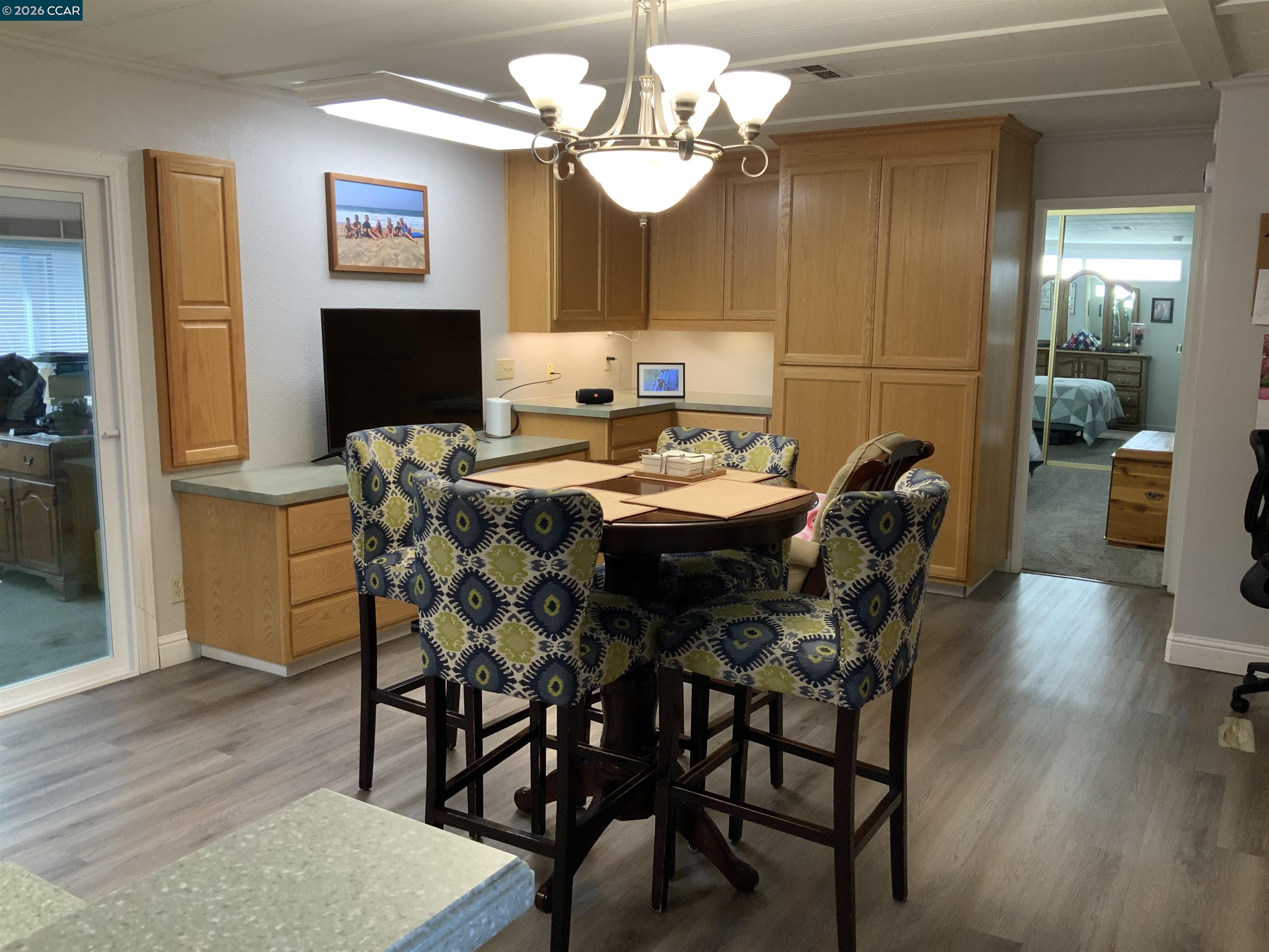 238 Aloha Pittsburg, CA 94565 - Photo 10 of 42 a view of a dining room with furniture and wooden floor