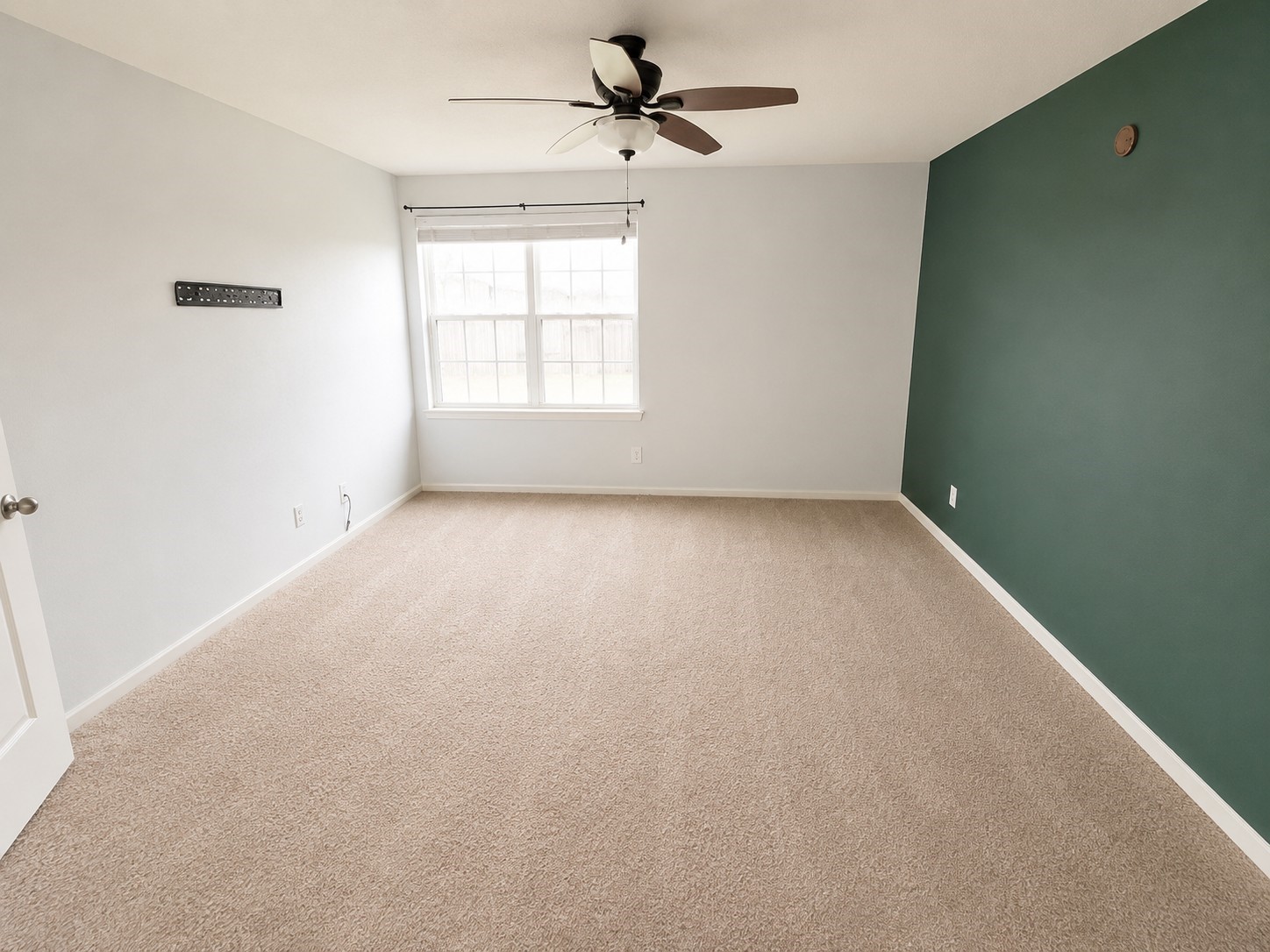 341 Comanche Plains Road La Marque, TX 77568 - Photo 8 of 17 an empty room with windows and ceiling fan