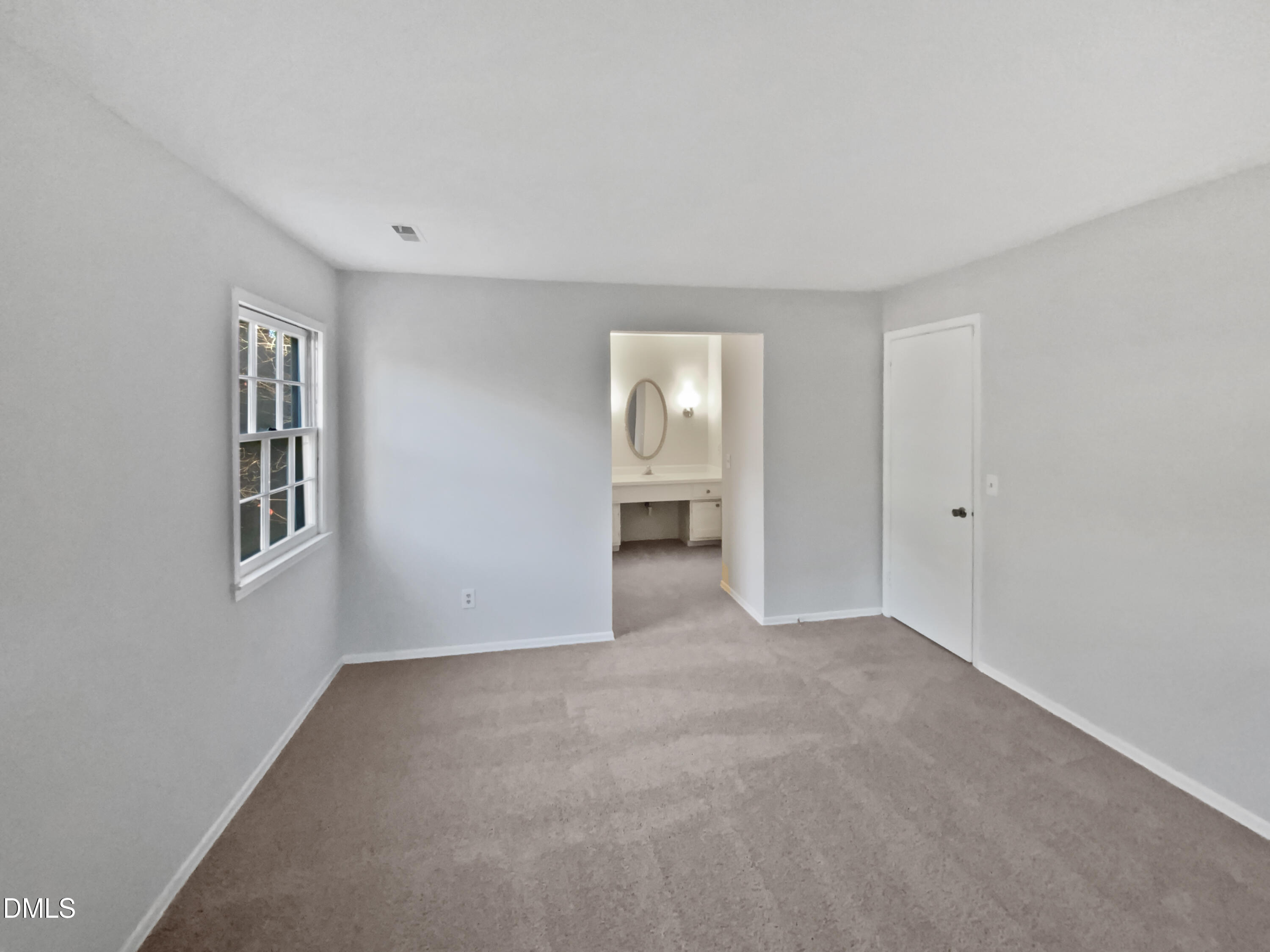 3136 Merrianne Drive Raleigh, NC 27607 - Photo 11 of 20 a view of an empty room with a window