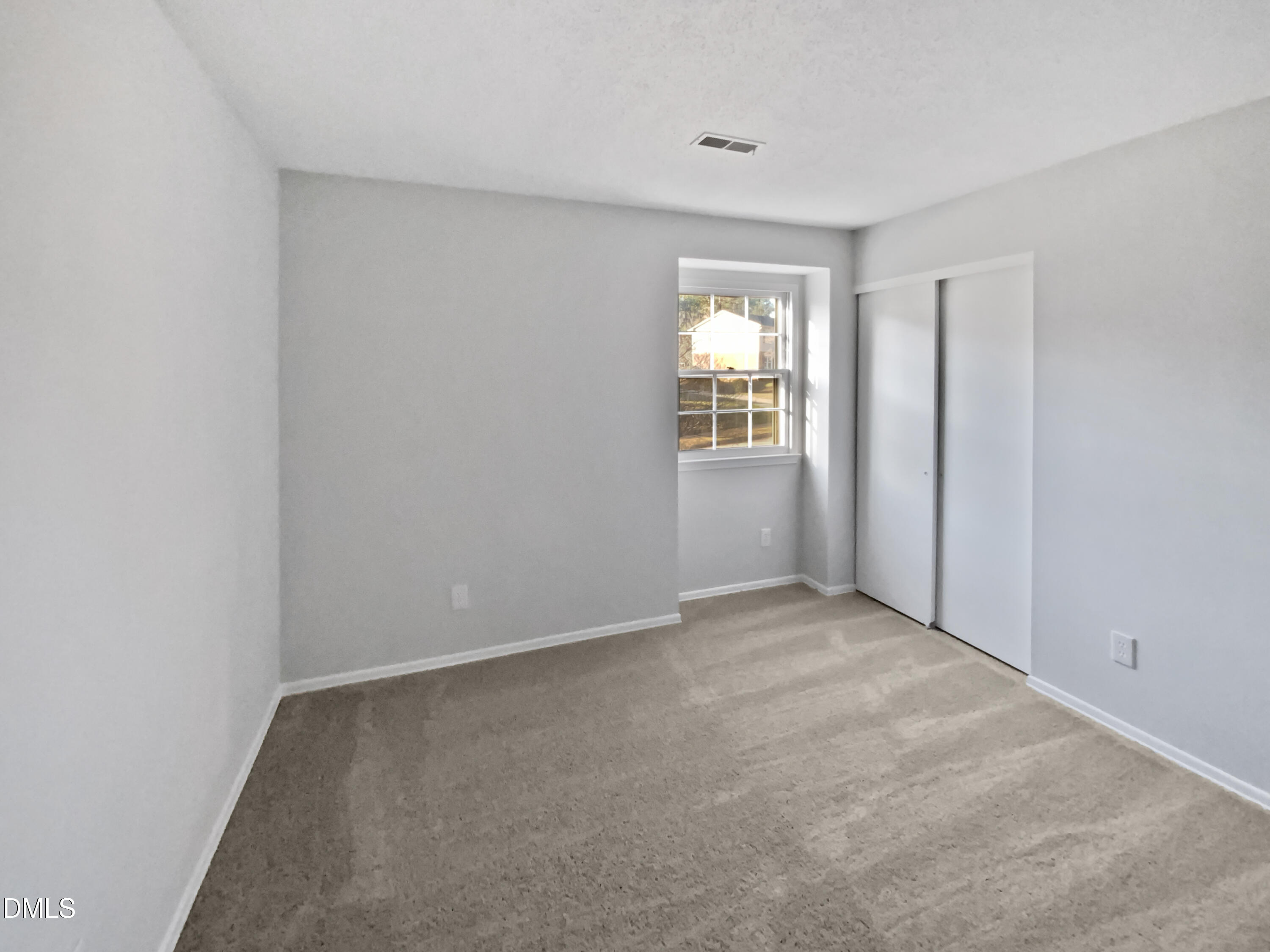 3136 Merrianne Drive Raleigh, NC 27607 - Photo 16 of 20 an empty room with windows