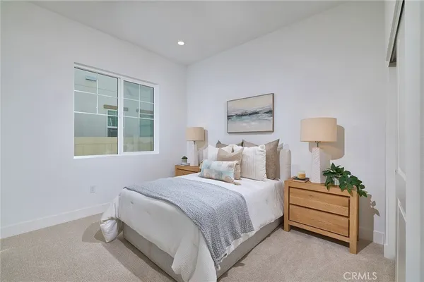 a view of an empty room with windows