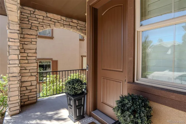 a view of a door and a window