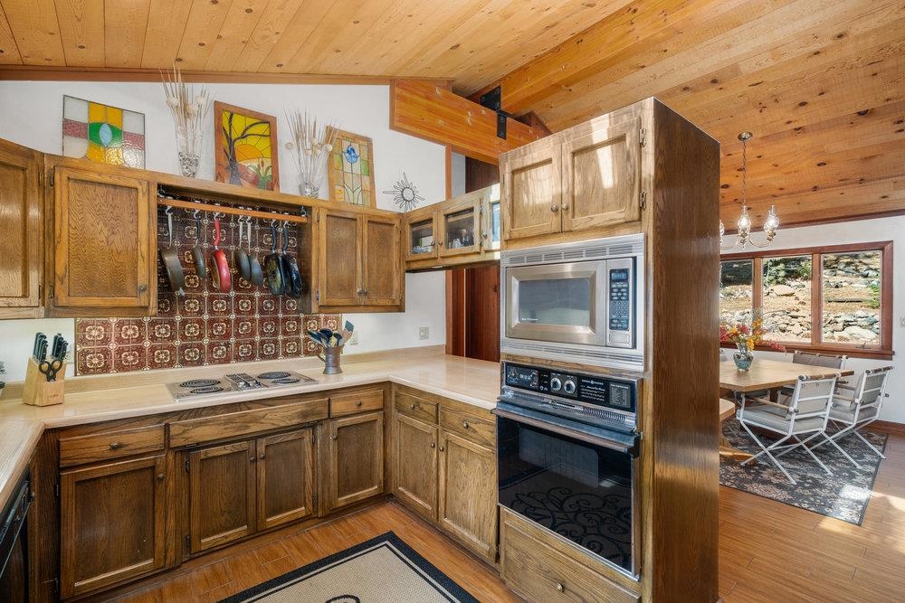 138 Tiger Tail Road Olympic Valley, CA 96146 - Photo 15 of 28 a kitchen with stainless steel appliances a stove and a sink