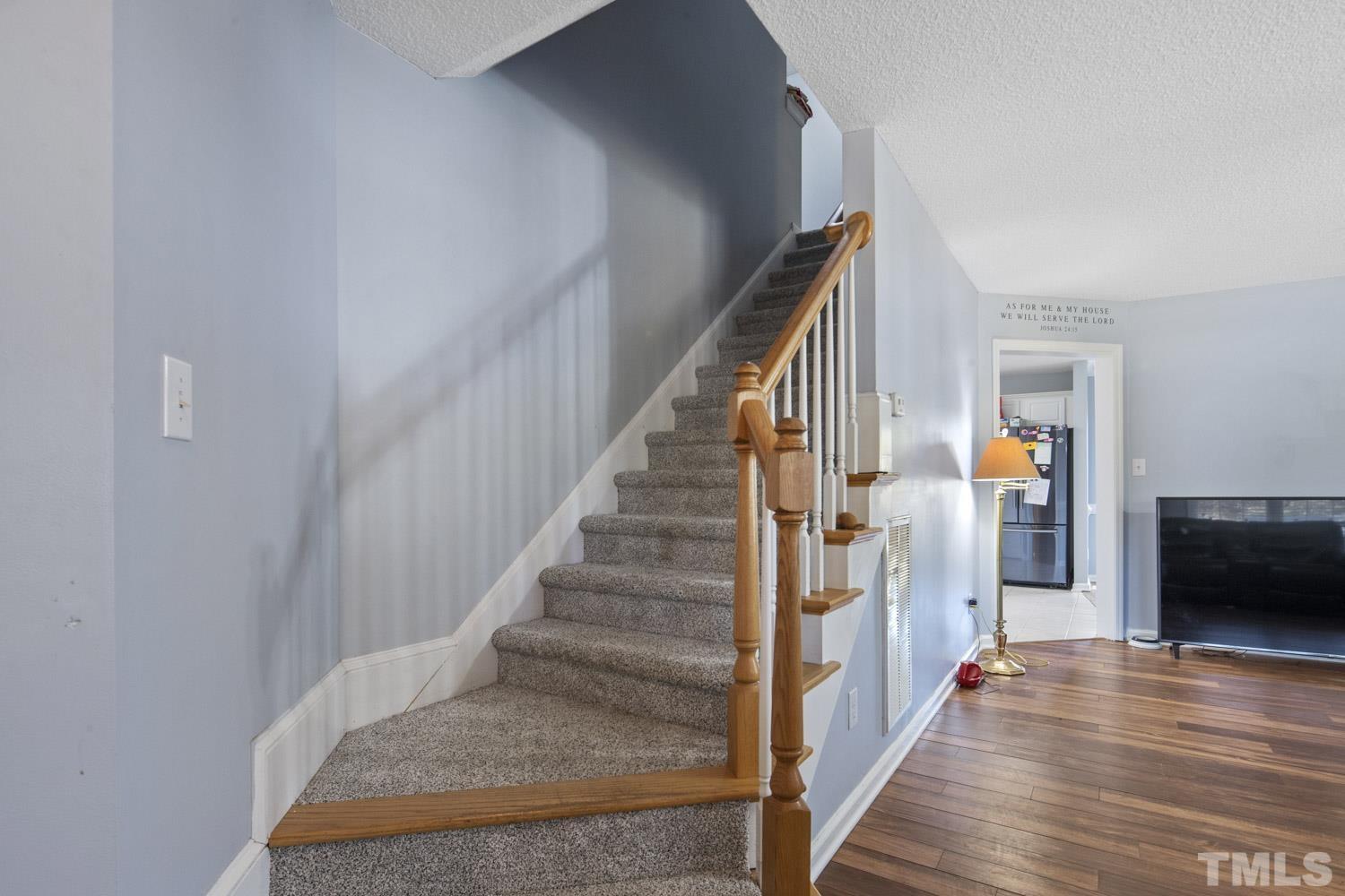 476 Saddle Ridge Drive Willow Spring, NC 27592 - Photo 17 of 30 a view of entryway and hall with wooden floor