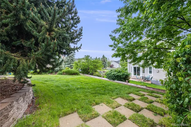 an aerial view of a house with a lake view