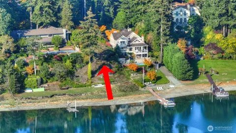 a view of swimming pool with a yard and seating area