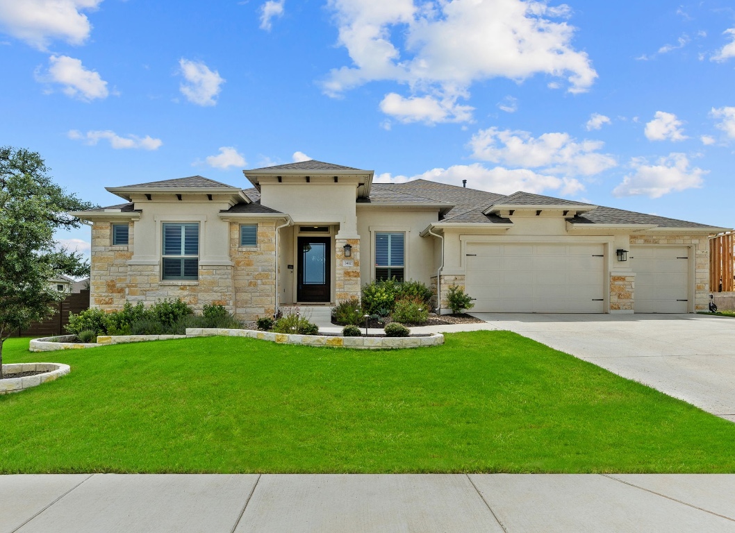 front view of a house with a yard