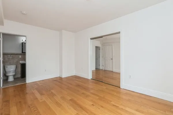 a view of an empty room and window