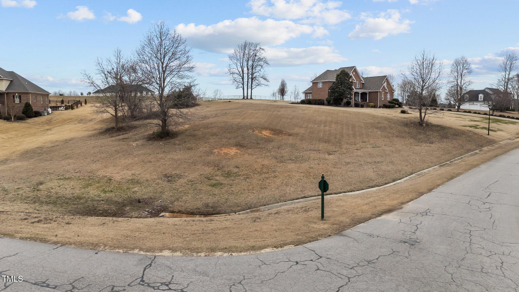 724 Cambridge Drive Rocky Mount, NC 27804 - Photo 6 of 13 a view of a backyard of the house