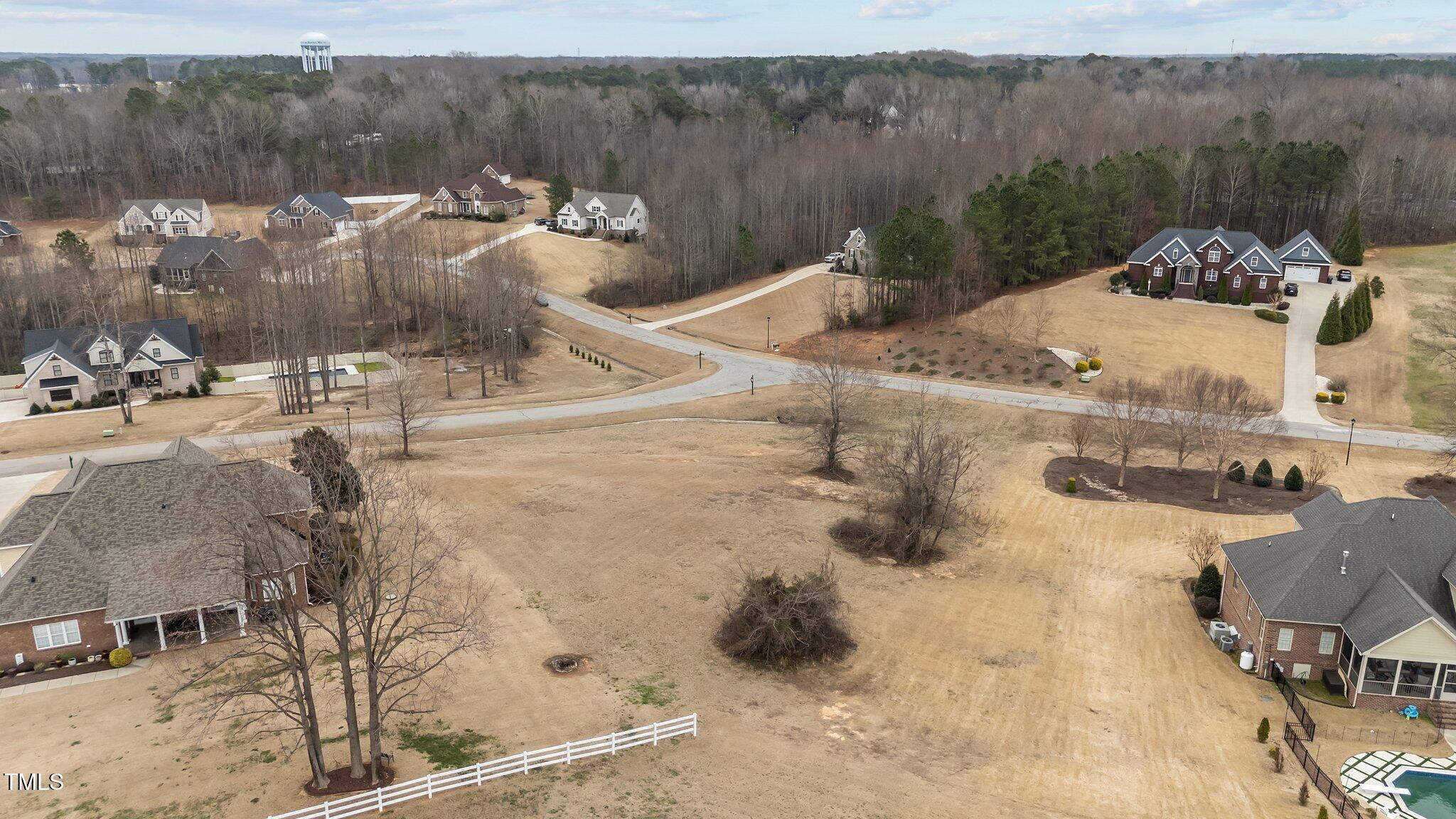 724 Cambridge Drive Rocky Mount, NC 27804 - Photo 7 of 13 a view of a swimming pool with a yard