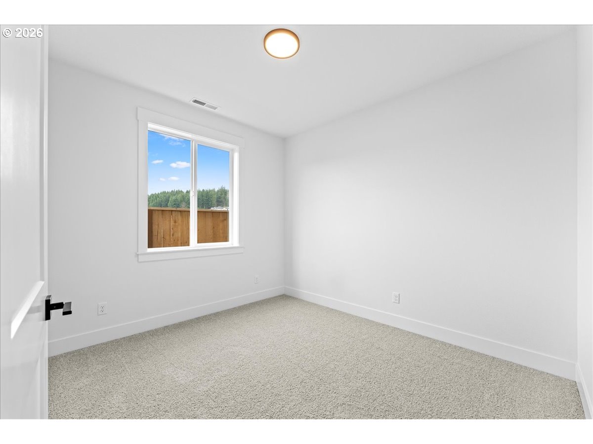 789 Riley Drive Northeast Silverton, OR 97381 - Photo 12 of 24 a view of an empty room with a window