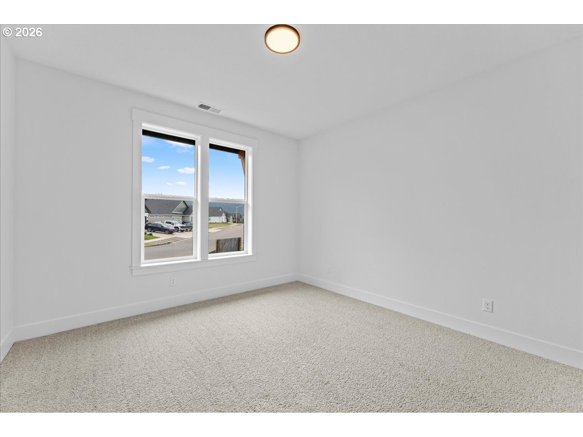 789 Riley Drive Northeast Silverton, OR 97381 - Photo 13 of 24 a view of an empty room with a window
