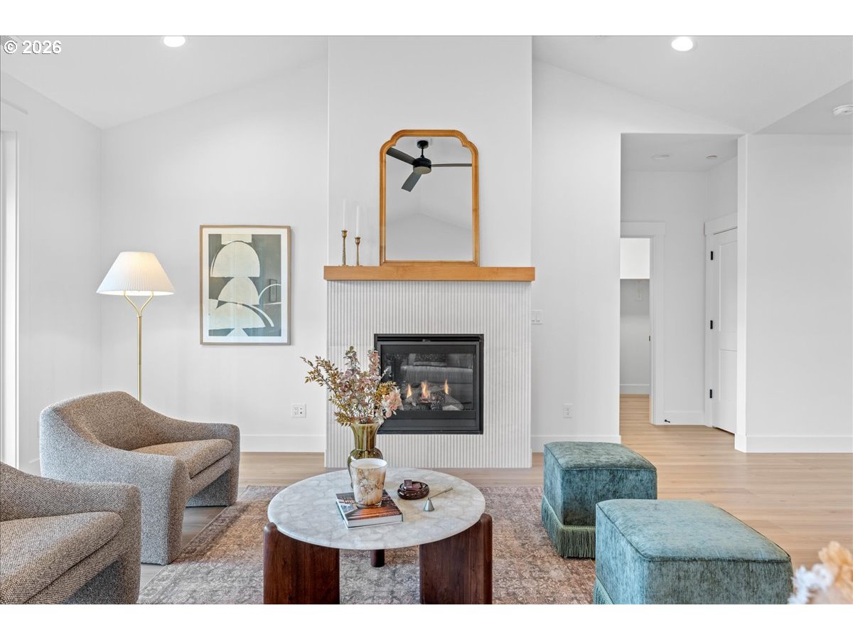 789 Riley Drive Northeast Silverton, OR 97381 - Photo 4 of 24 a living room with furniture and a fireplace