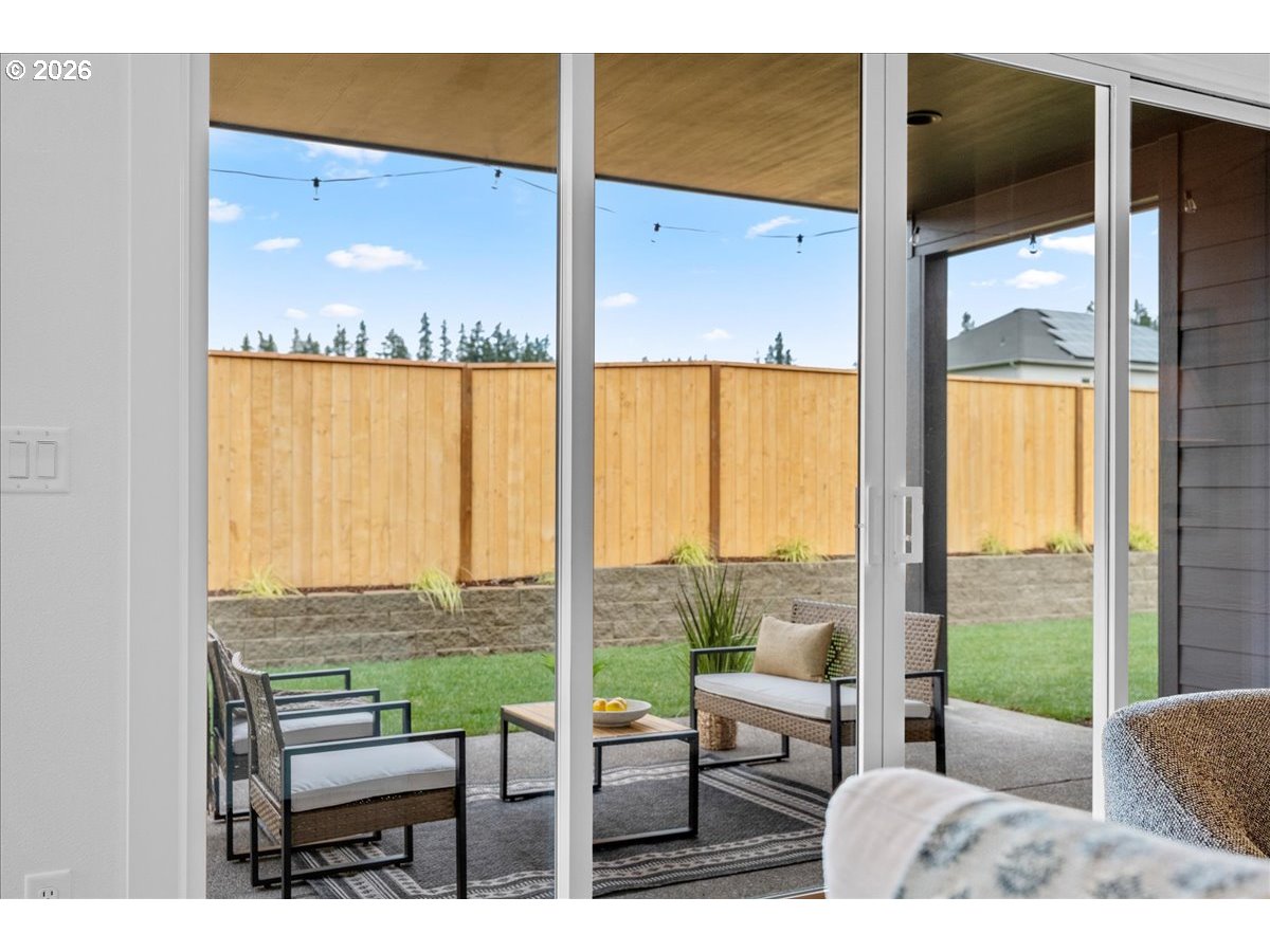 789 Riley Drive Northeast Silverton, OR 97381 - Photo 6 of 24 a living room with furniture and a large window