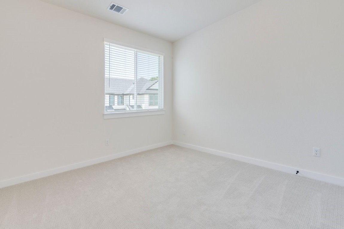 2600 Gattis School Road, Unit 101 Round Rock, TX 78664 - Photo 19 of 23 an empty room with a window