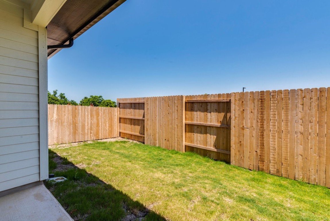 2600 Gattis School Road, Unit 101 Round Rock, TX 78664 - Photo 22 of 23 a view of an empty room with a small yard
