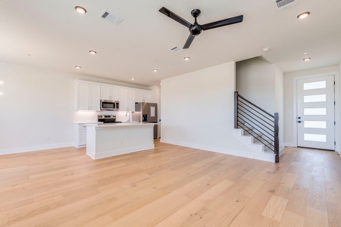 2600 Gattis School Road, Unit 101 Round Rock, TX 78664 - Photo 23 of 23 a view of kitchen with wooden floor and window
