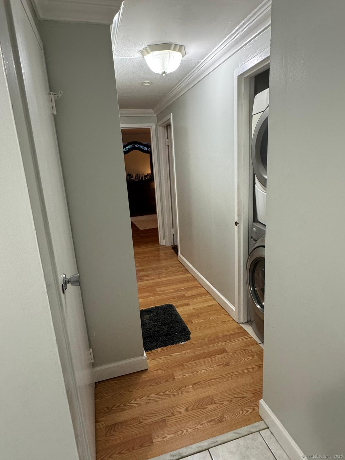 126 Triangle Street, Unit B13 Danbury, CT 06810 - Photo 8 of 29 a view of a hallway view with staircase