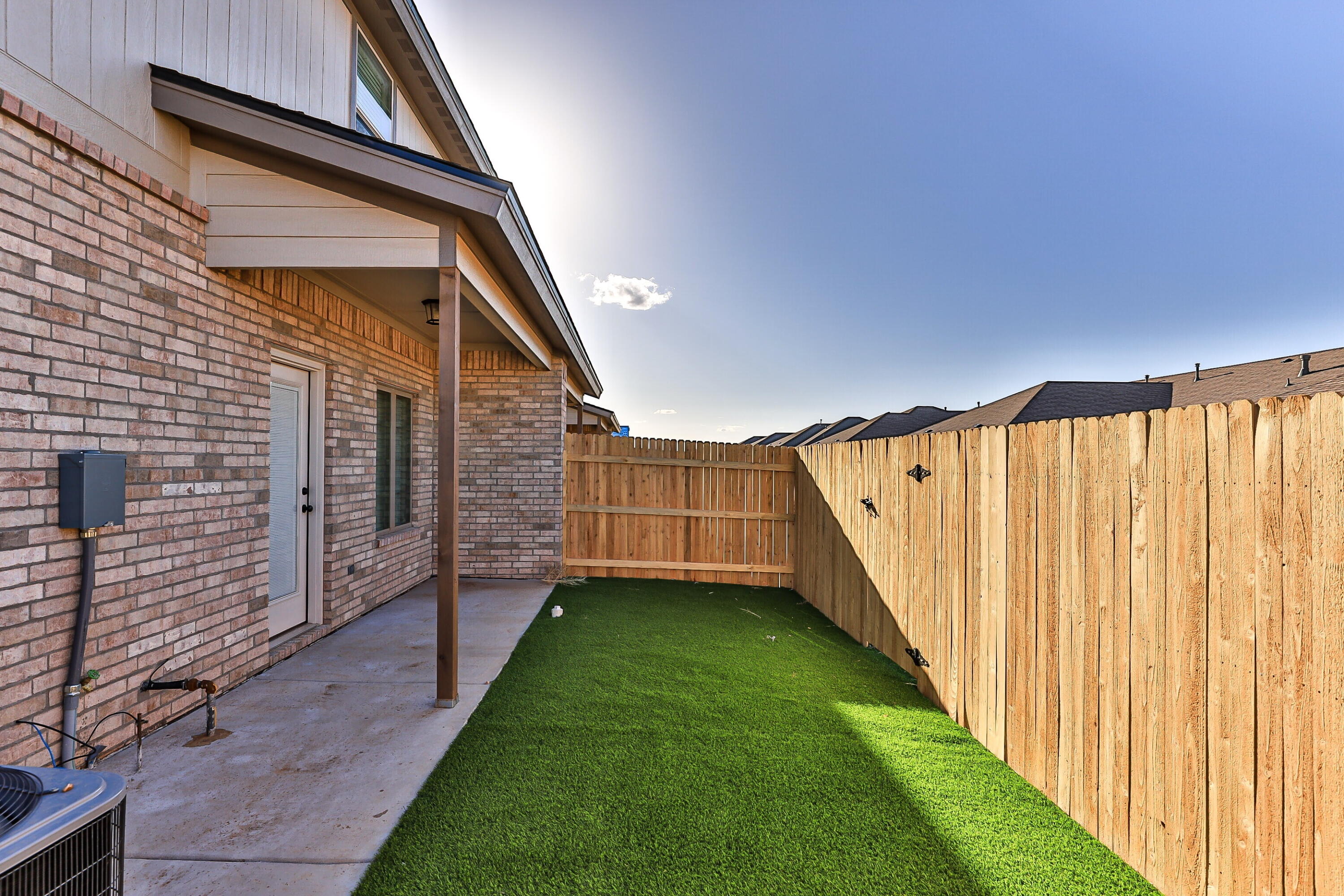 2526 138th Street Lubbock, TX 79423 - Photo 36 of 36 a view of a pathway of a house with a yard