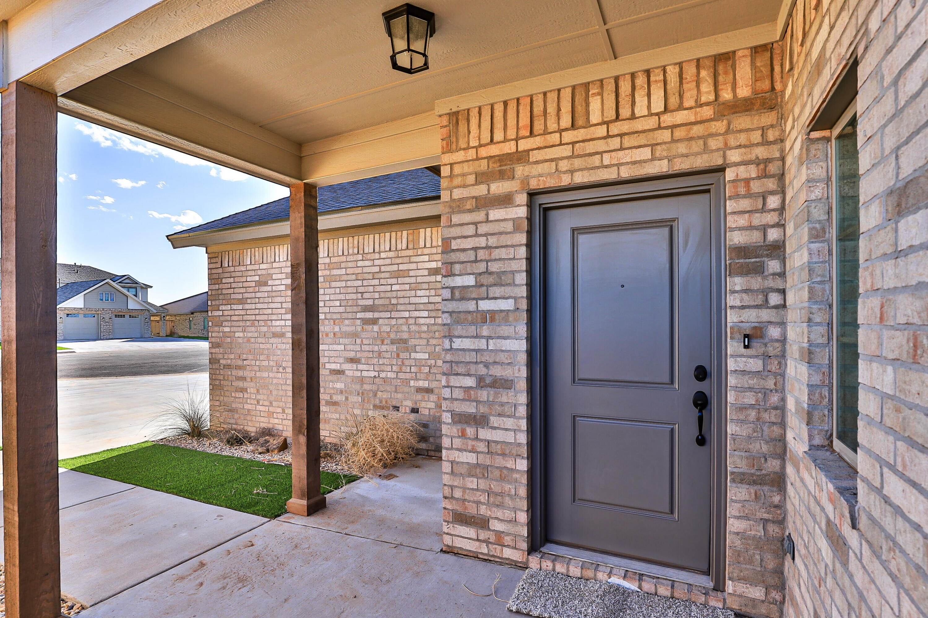 2526 138th Street Lubbock, TX 79423 - Photo 6 of 36 a front view of a house with a garden