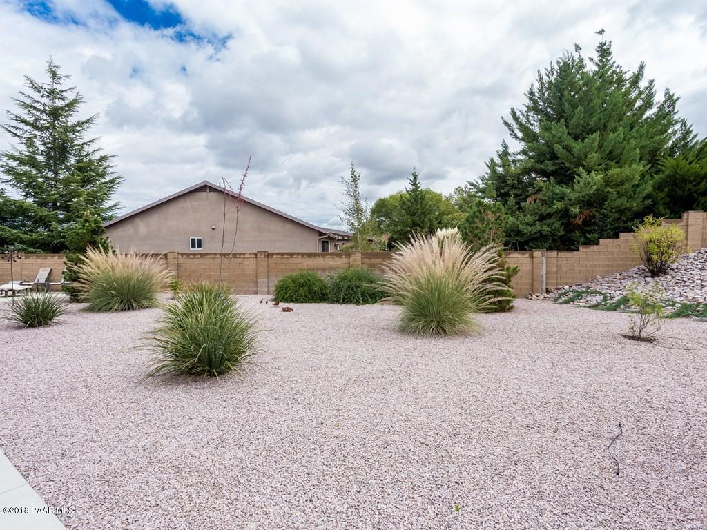 7969 North Sunset Ridge Prescott Valley, AZ 86315 - Photo 17 of 19 a view of a house with a street