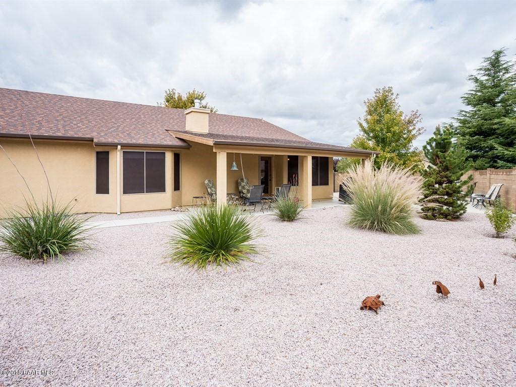 7969 North Sunset Ridge Prescott Valley, AZ 86315 - Photo 18 of 19 a front view of house with yard
