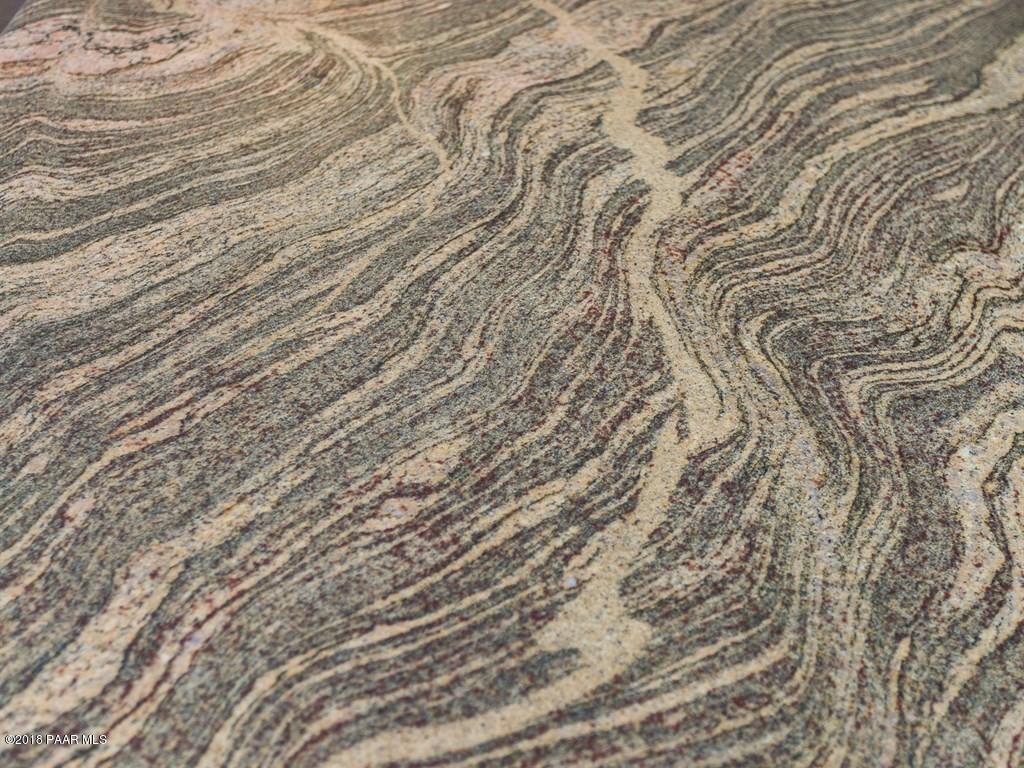7969 North Sunset Ridge Prescott Valley, AZ 86315 - Photo 7 of 19 a close up of a white marble wall