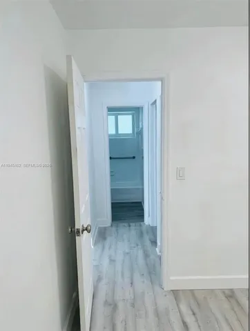 a bathroom with a sink toilet and bathtub