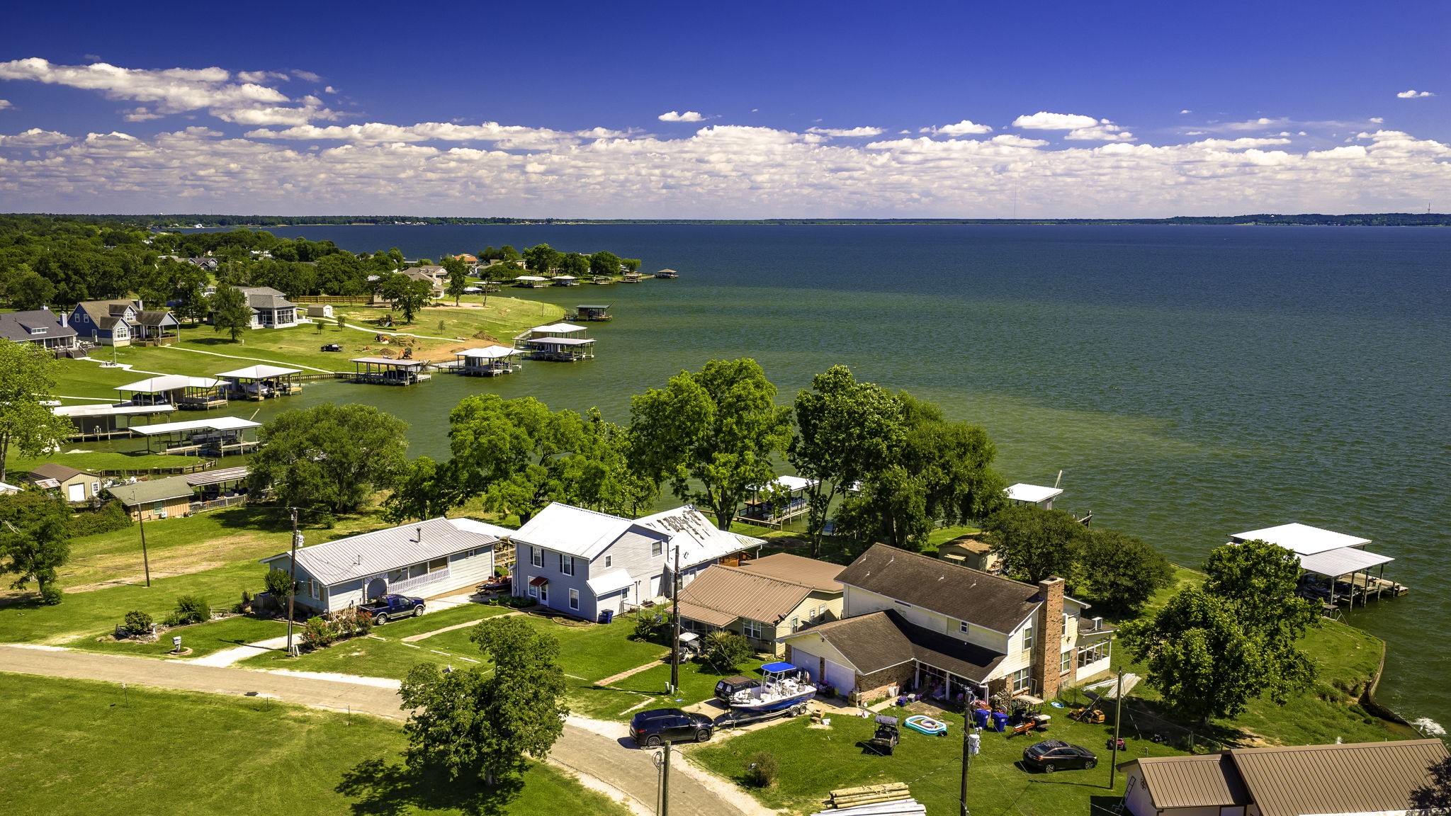 536 Weavers Cove Road Livingston, TX 77351 - Photo 34 of 44 a view of a lake with houses