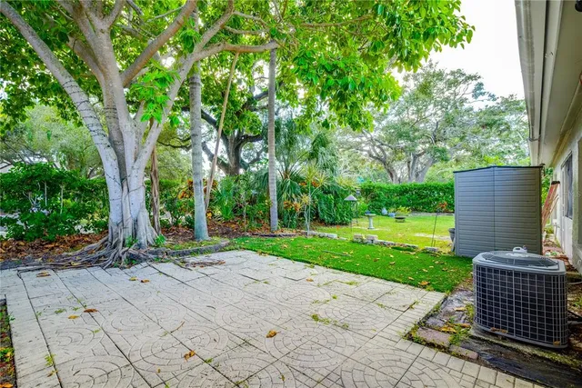 a view of a backyard with a garden