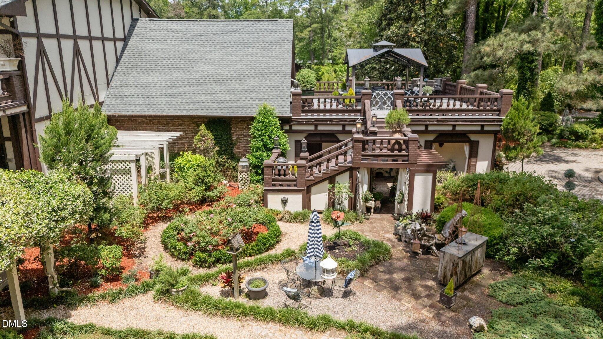768 Bethesda Church Road Orrum, NC 28369 - Photo 6 of 91 a front view of a house with a garden