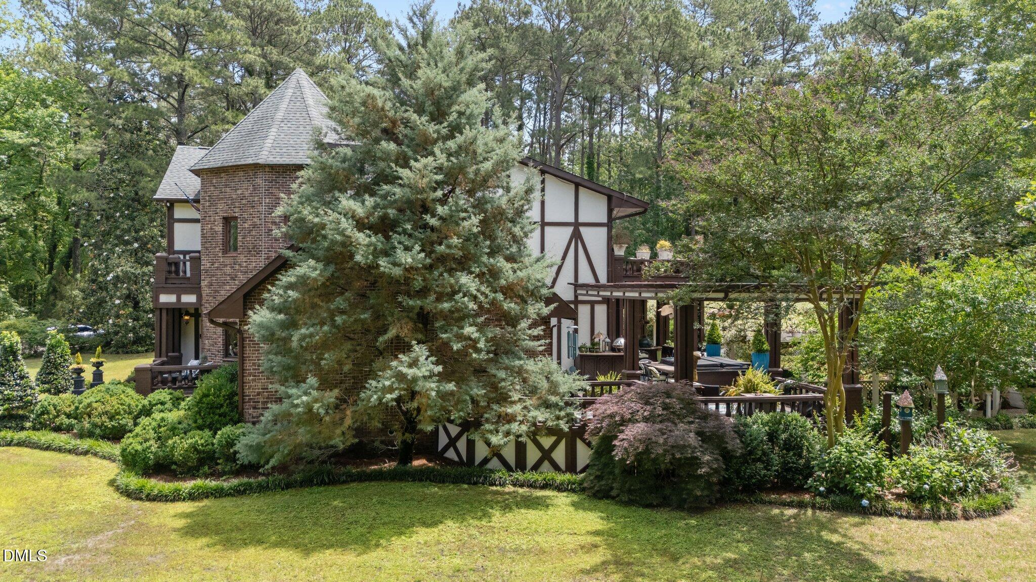 768 Bethesda Church Road Orrum, NC 28369 - Photo 10 of 91 a front view of a house with a yard and fountain