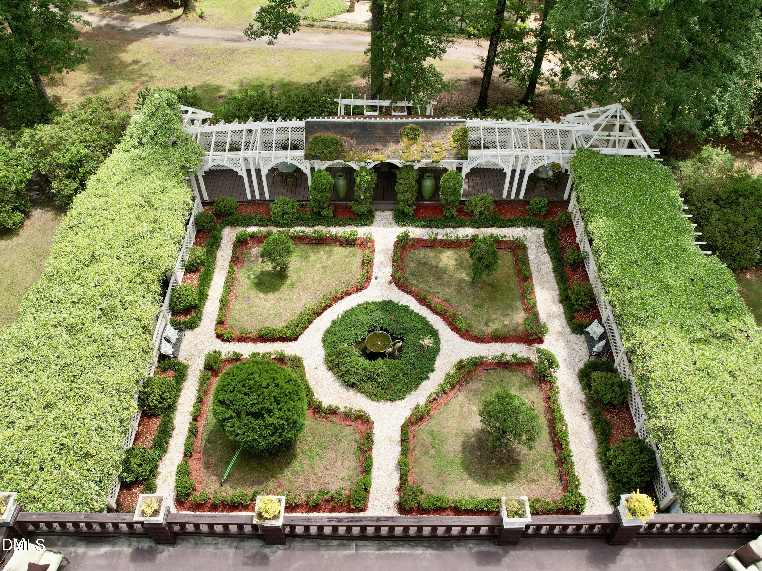 768 Bethesda Church Road Orrum, NC 28369 - Photo 16 of 91 an aerial view of a house with outdoor space swimming pool and tennis court