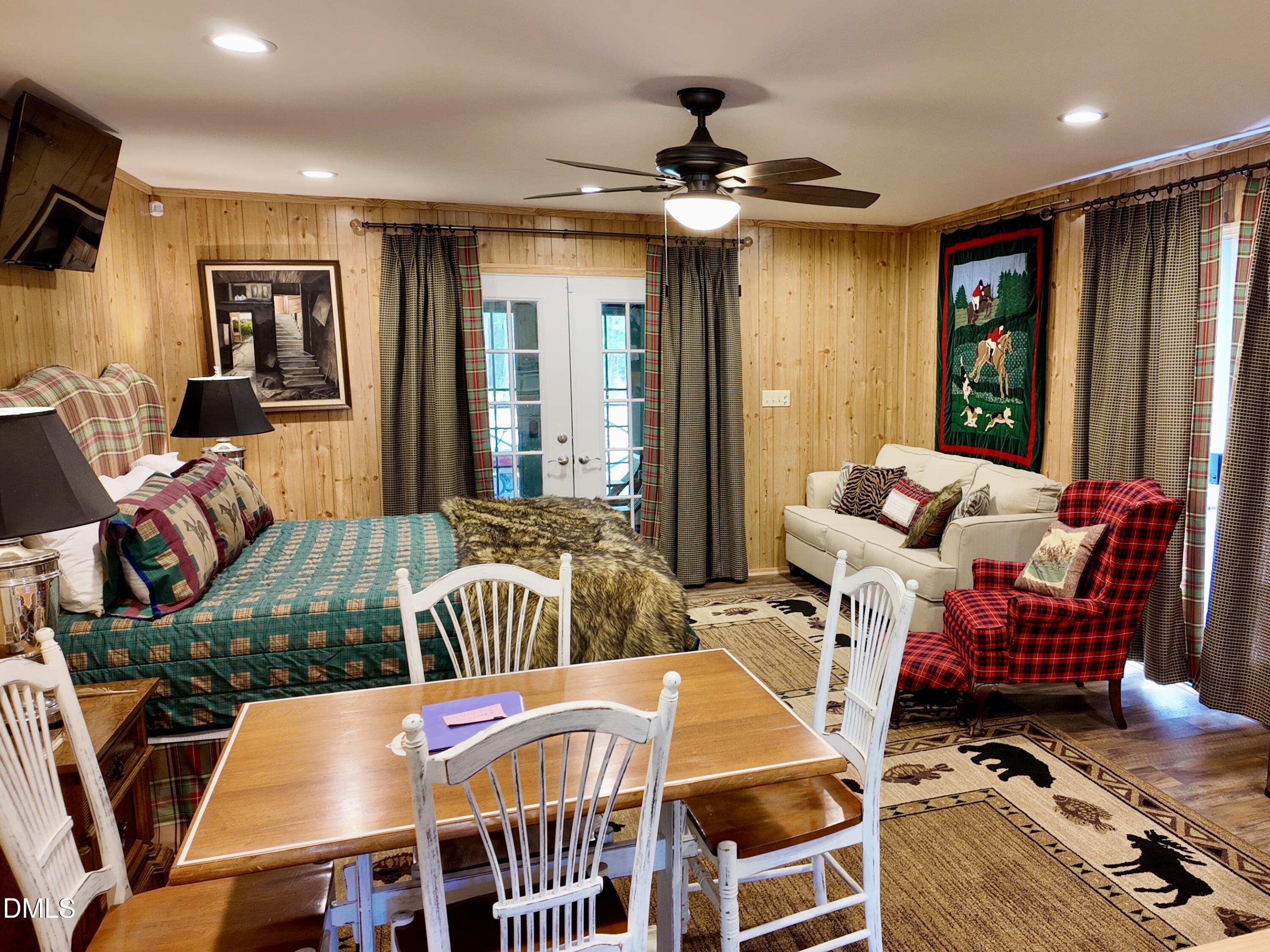 768 Bethesda Church Road Orrum, NC 28369 - Photo 35 of 91 a bedroom with furniture and a window