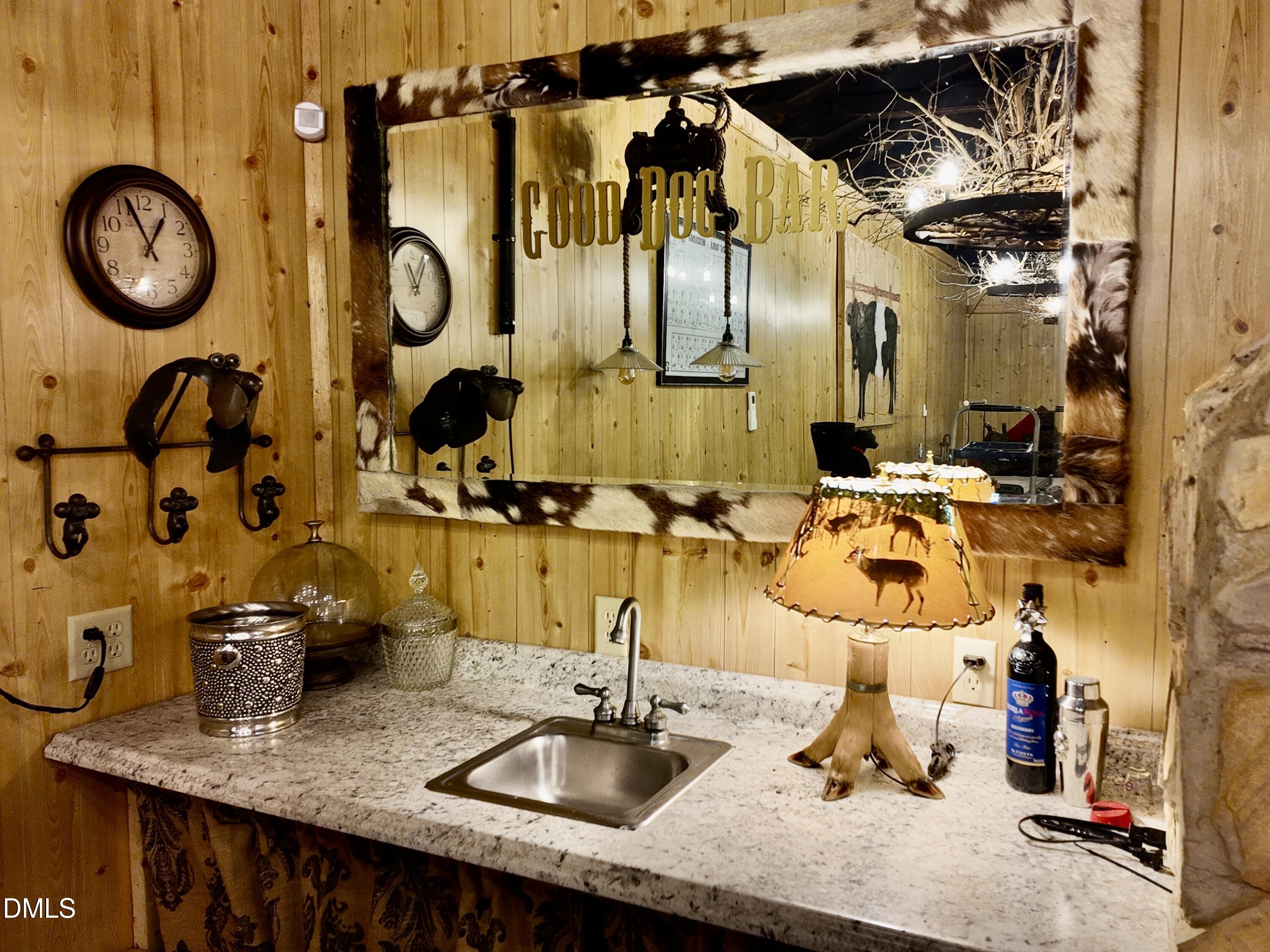768 Bethesda Church Road Orrum, NC 28369 - Photo 42 of 91 a bathroom with a sink and a mirror