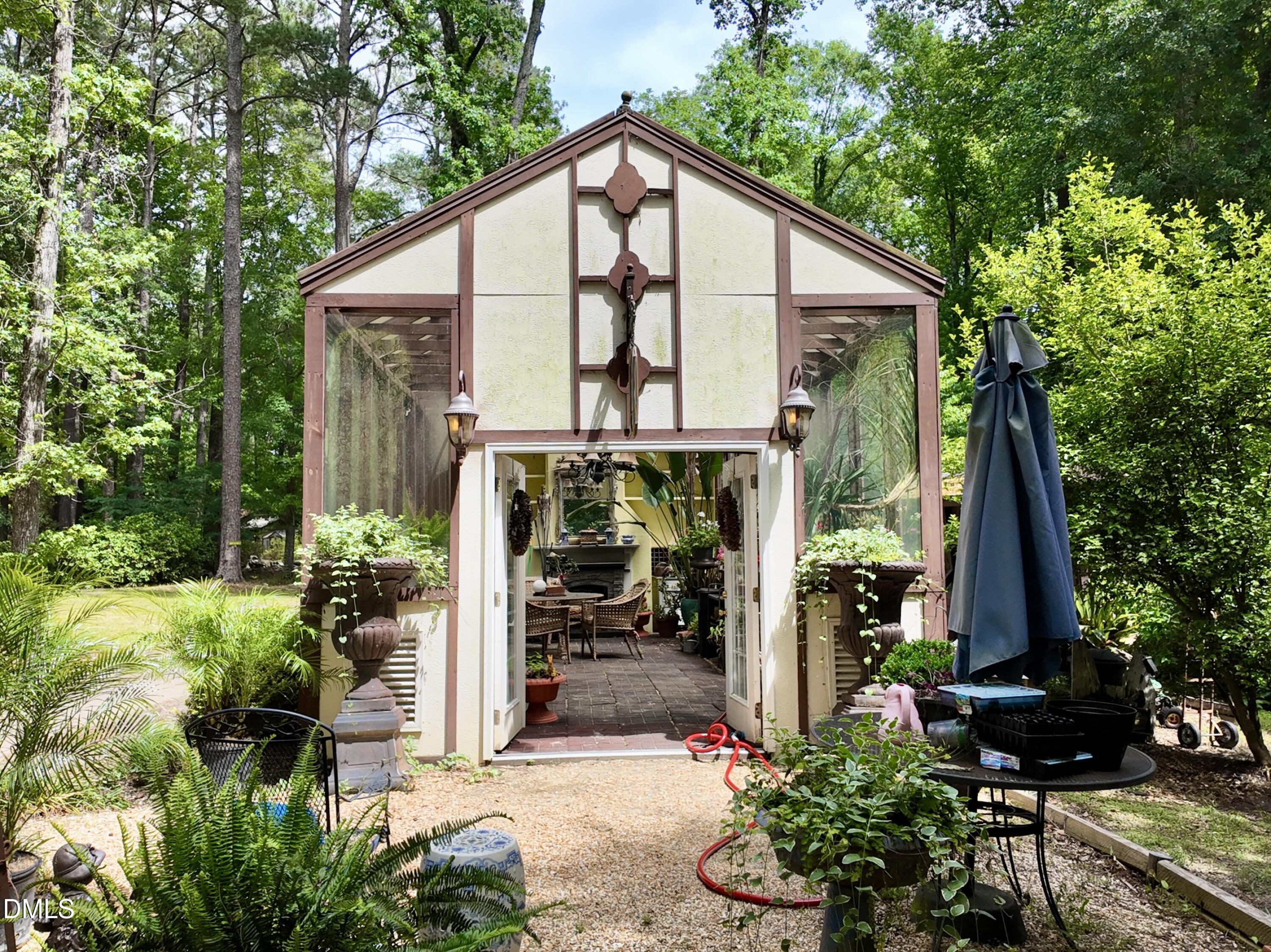 768 Bethesda Church Road Orrum, NC 28369 - Photo 56 of 91 a view of a house with backyard and sitting area