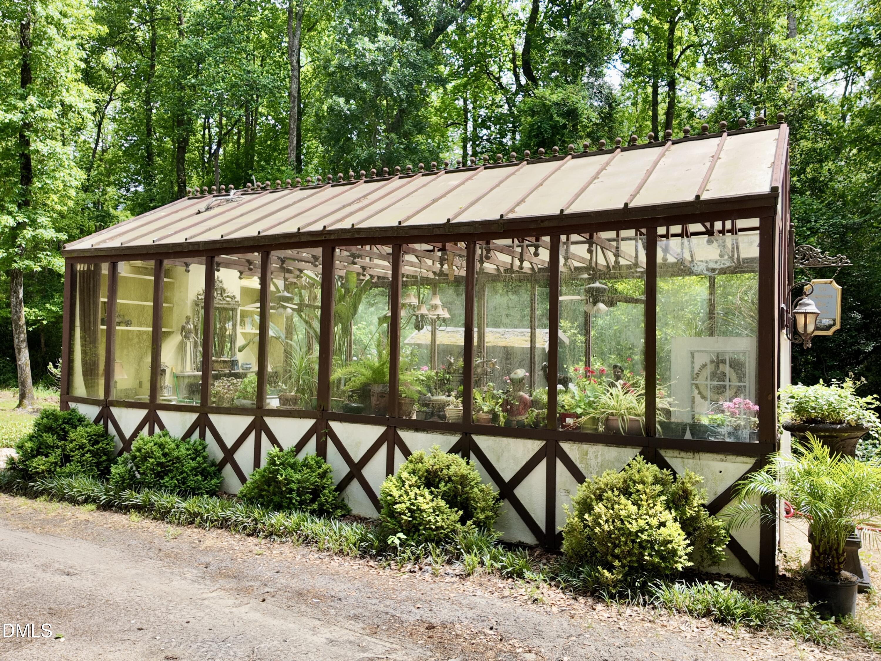 768 Bethesda Church Road Orrum, NC 28369 - Photo 57 of 91 a view of a white house with a yard and outdoor seating