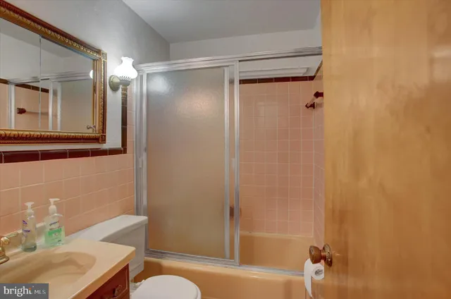 a view of a room with a wooden walls