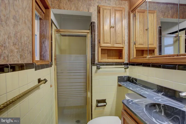 a view of a room with wooden walls