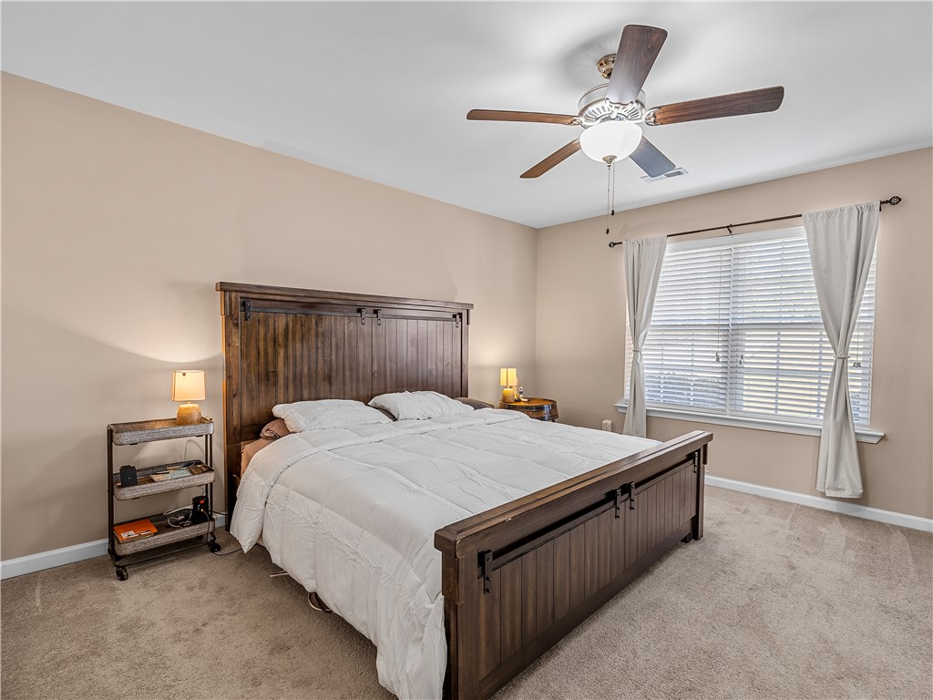2520 Linmar Circle Anderson, SC 29621 - Photo 22 of 50 Relax in comfort with a large bedroom window and soft carpet flooring.