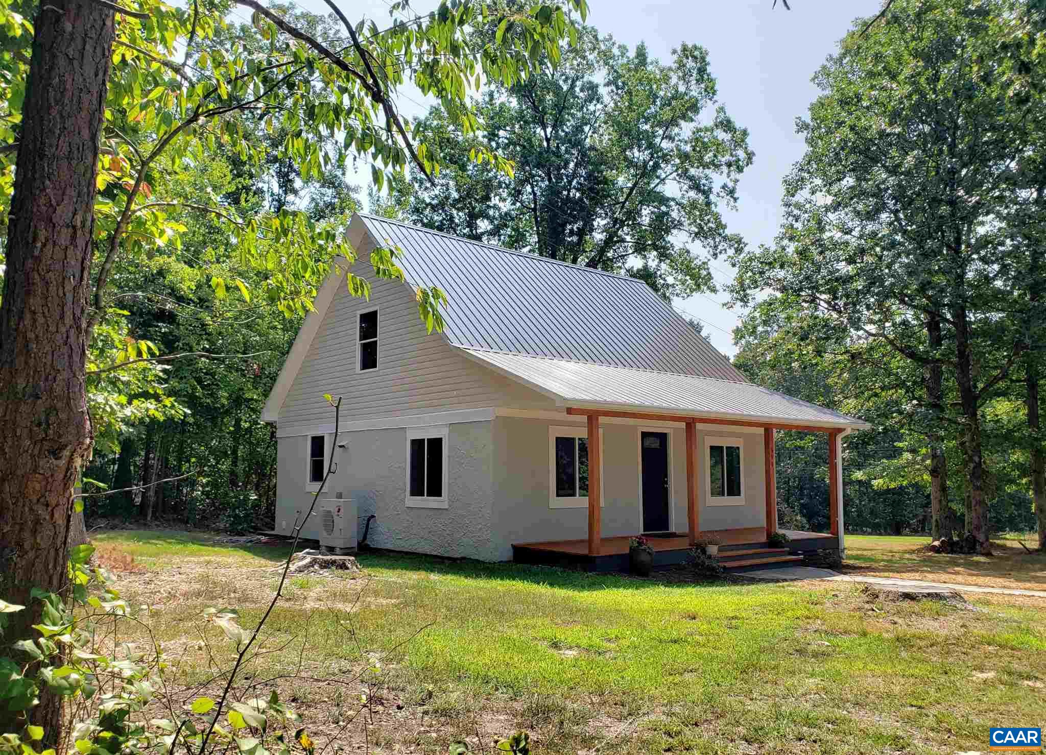 699 Black Cat Road Keswick, VA 22947 - Photo 1 of 33 a view of a house with a yard
