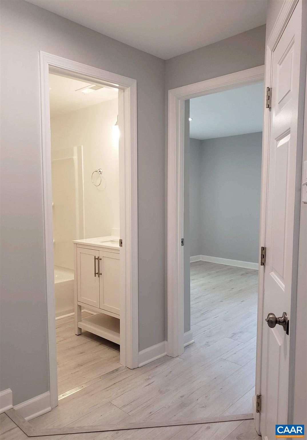 699 Black Cat Road Keswick, VA 22947 - Photo 13 of 33 an empty room with closet and a bathroom