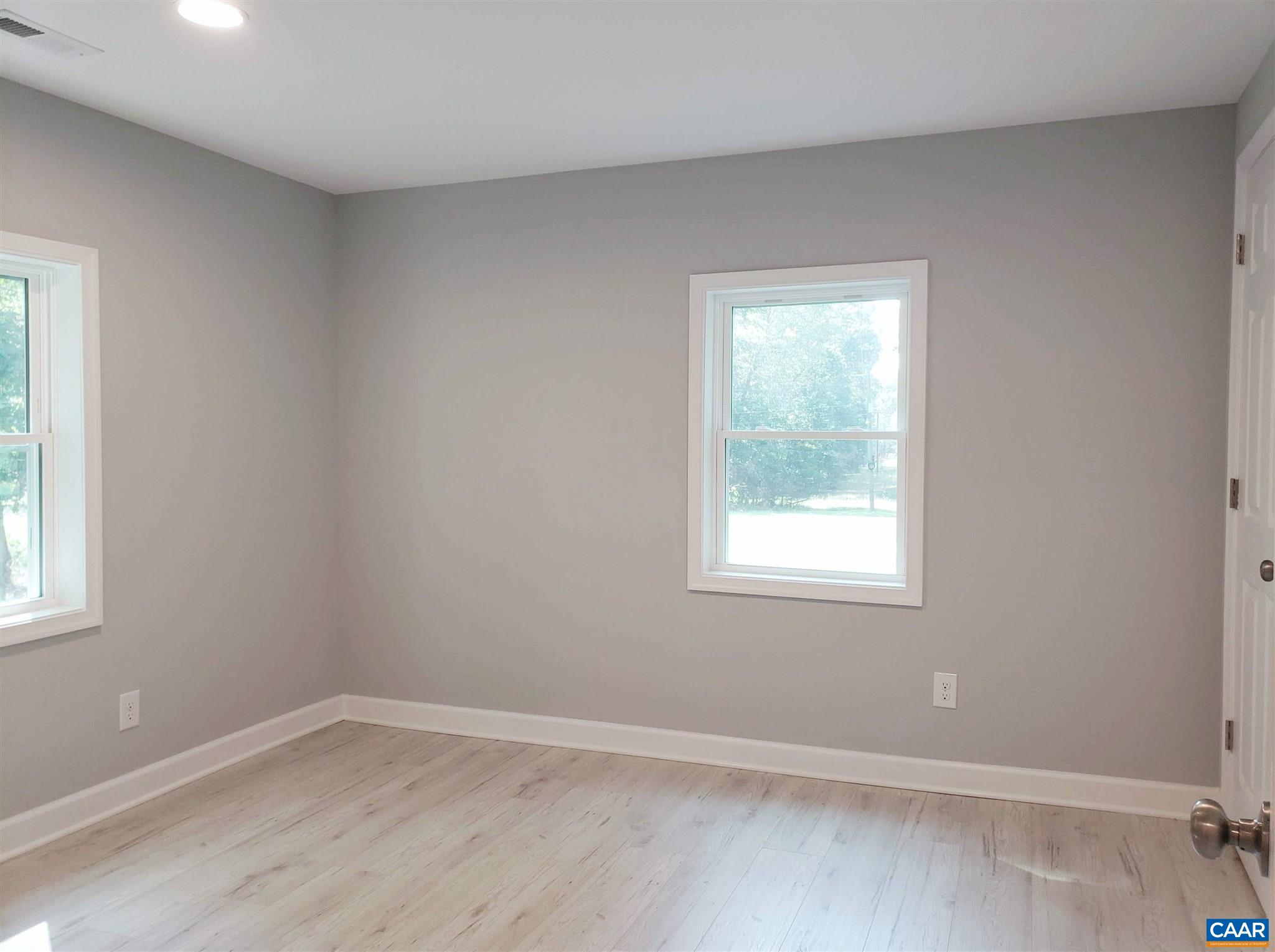 699 Black Cat Road Keswick, VA 22947 - Photo 15 of 33 an empty room with a window