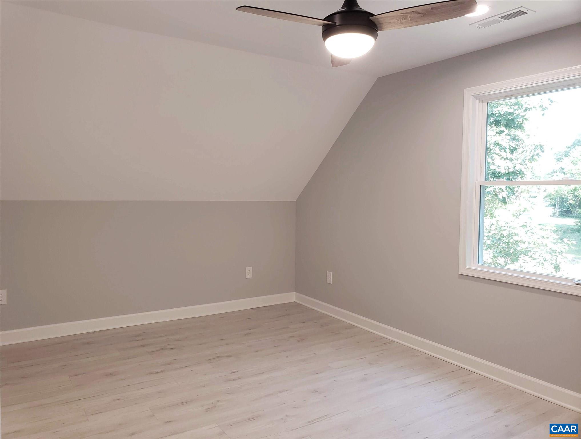 699 Black Cat Road Keswick, VA 22947 - Photo 24 of 33 an empty room with a window