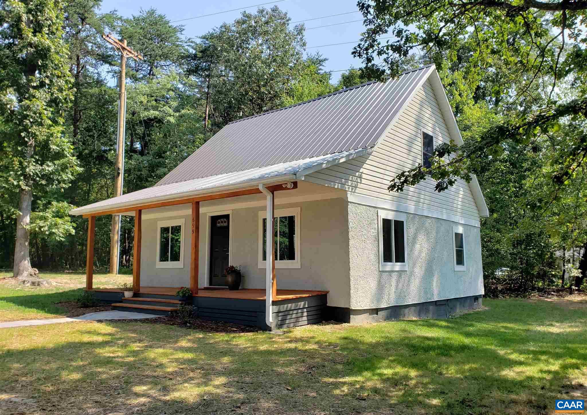 699 Black Cat Road Keswick, VA 22947 - Photo 31 of 33 a view of a house with backyard and garden