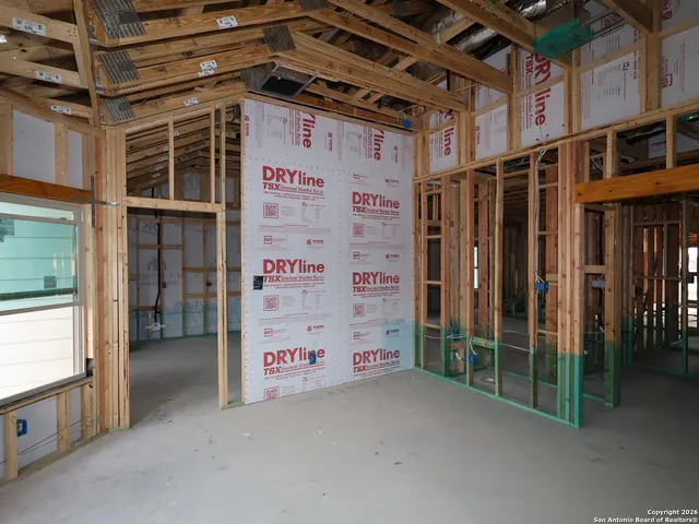 a view of entry way with wooden door