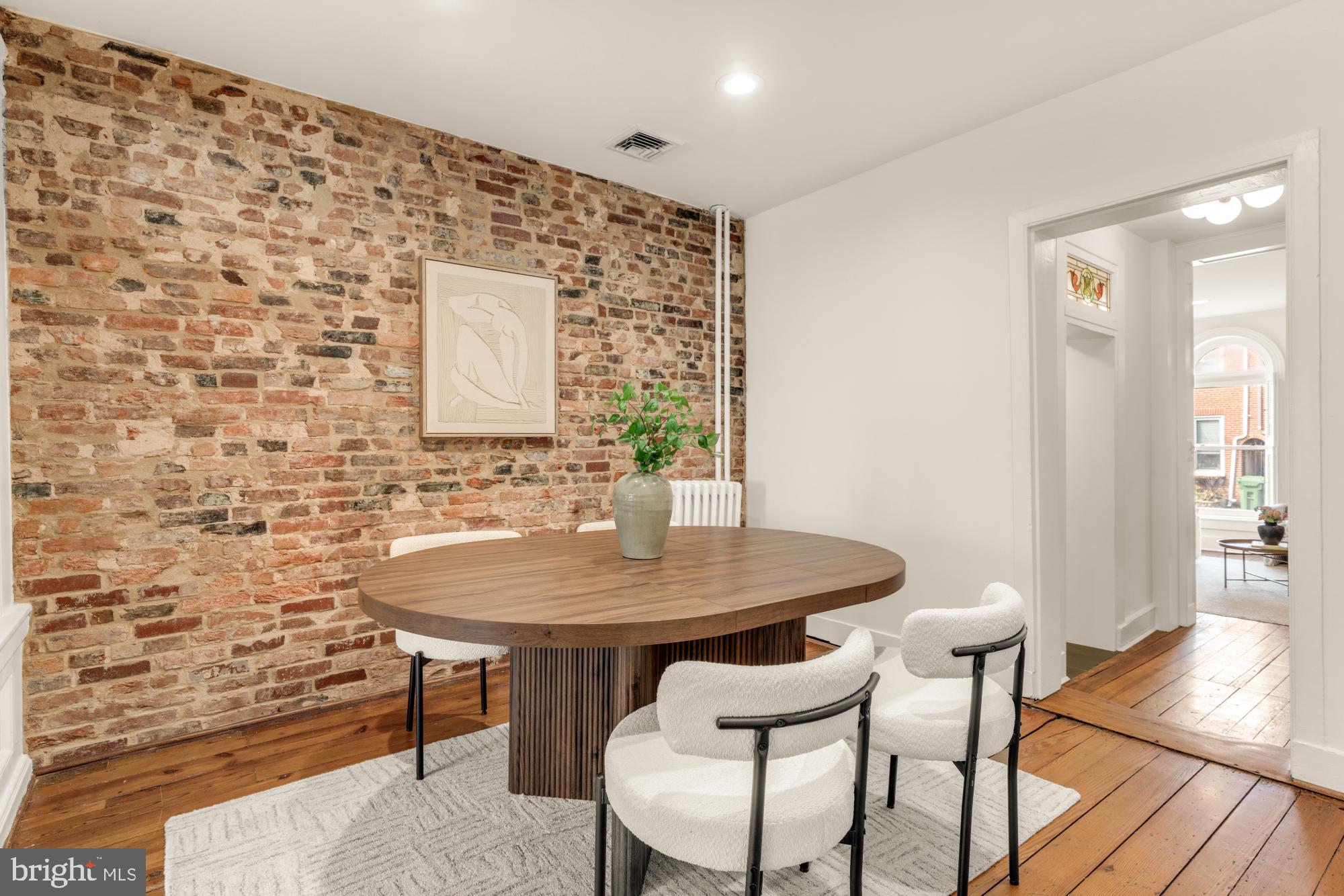 1213 Battery Avenue Baltimore, MD 21230 - Photo 13 of 39 a view of a dining room with furniture and wooden floor
